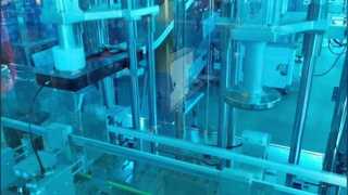 Máquina de tapado automático lineal con elevador