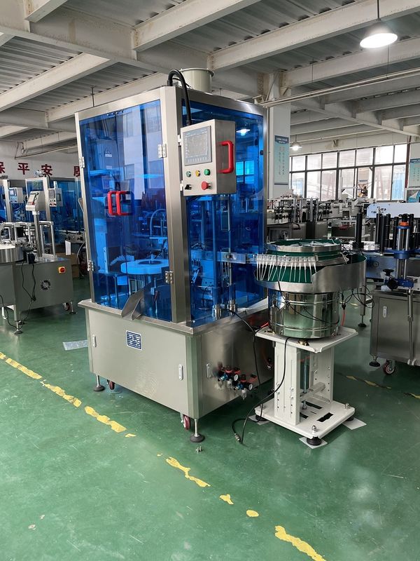 Máquina automática de llenado y tapado de pulverizador de pluma de 220V 50Hz 2kW con 1500-2000BPH y volumen de llenado de 5-50ml